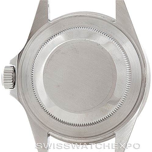 The image shows the back case and crown of a Rolex Submariner 16610 Men's Stainless Steel Black Dial 16610 Men's Stainless Steel Black Dial watch.