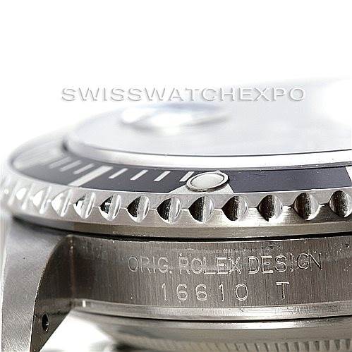 The image shows a close-up of the bezel and side of the Rolex Submariner 16610 Men's Stainless Steel Black Dial 16610 Men's Stainless Steel Black Dial, model number 16610 T.