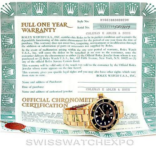 The image shows a Rolex Submariner 16618 Men
s Yellow Gold Black Dial 16618 Men
s Yellow Gold Black Dial watch positioned angled from the front and to the right, along with its warranty card and certification.