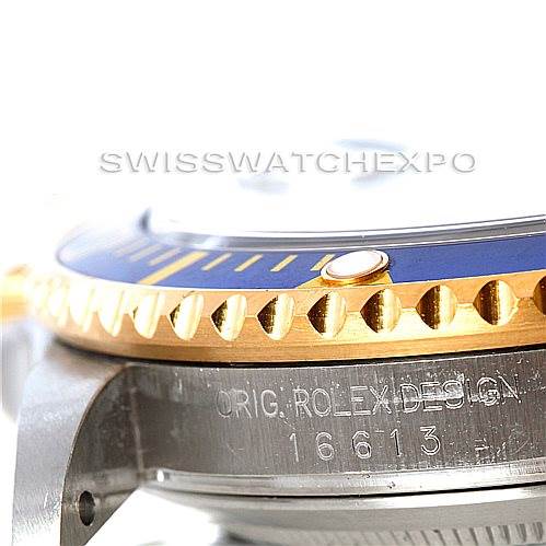 Close-up side angle of a Rolex Submariner 16613 Men's Steel and Gold (two tone) Grey Dial 16613 Men's Steel and Gold (two tone) Grey Dial, showing the bezel and engraved case with "16613" and "ORIG. ROLEX DESIGN."