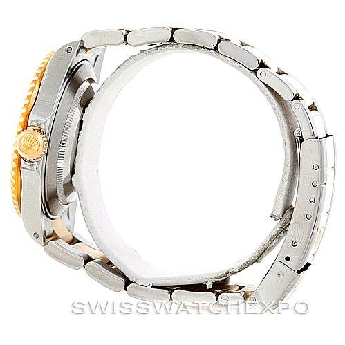 The image shows a side view of a Rolex Submariner 16613 Men's Steel and Gold (two tone) Grey Dial 16613 Men's Steel and Gold (two tone) Grey Dial watch, focusing on its case and bracelet.