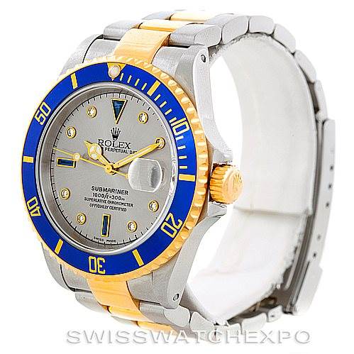 This image shows a Rolex Submariner 16613 Men's Steel and Gold (two tone) Grey Dial 16613 Men's Steel and Gold (two tone) Grey Dial watch at a front three-quarter angle, highlighting the bezel, dial, case, and bracelet.