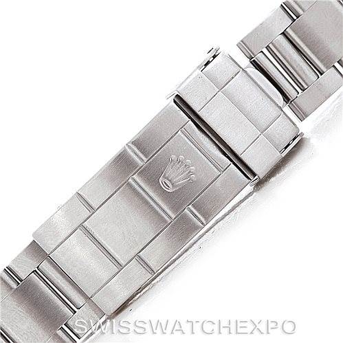 The image shows a close-up of the clasp and bracelet of a Rolex Submariner 14060 Men
s Stainless Steel Black Dial 14060 Men
s Stainless Steel Black Dial watch.