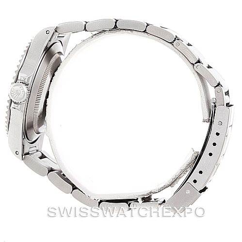 The image shows a side view of a Rolex Submariner 14060 Men
s Stainless Steel Black Dial 14060 Men
s Stainless Steel Black Dial watch, highlighting the bracelet and crown.