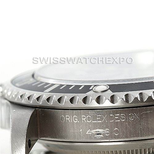 The image shows a close-up side view of the bezel and side of the case of a Rolex Submariner 14060 Men
s Stainless Steel Black Dial 14060 Men
s Stainless Steel Black Dial, with the model number engraved.