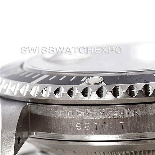 The image shows a close-up side view of the bezel and case of a Rolex Submariner 16610 Men
s Stainless Steel Black Dial 16610 Men
s Stainless Steel Black Dial 16610 T model.