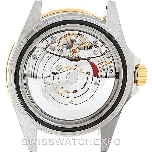 This image shows the back view of the Rolex Submariner 16613 Men
s Steel and Gold (two tone) Blue Dial 16613 Men
s Steel and Gold (two tone) Blue Dial watch, displaying its intricate automatic movement mechanism.