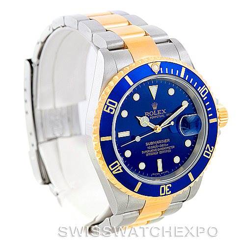 This image shows a Rolex Submariner 16613 Men
s Steel and Gold (two tone) Blue Dial 16613 Men
s Steel and Gold (two tone) Blue Dial watch angled from the left side, displaying the bezel, dial, case, and part of the bracelet.