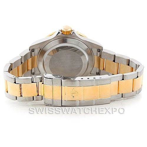 The image shows the back and bracelet of a Rolex Submariner 16613 Men
s Steel and Gold (two tone) Blue Dial 16613 Men
s Steel and Gold (two tone) Blue Dial watch, including the clasp and case back.