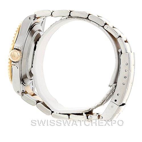 The image shows the side view of a Rolex Submariner 16613 Men's Steel and Gold (two tone) Champagne Dial 16613 Men's Steel and Gold (two tone) Champagne Dial watch, highlighting its case and bracelet.