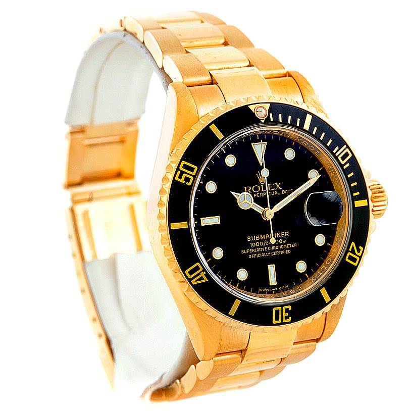 This image displays a gold Rolex Submariner 16618 Men
s Yellow Gold Black Dial 16618 Men
s Yellow Gold Black Dial, shown from a front left angle, highlighting the face, bezel, and bracelet.