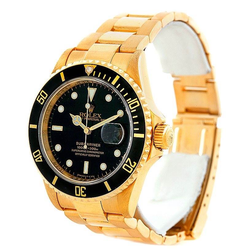 This image shows a Rolex Submariner 16618 Men
s Yellow Gold Black Dial 16618 Men
s Yellow Gold Black Dial watch angled from the front left, highlighting its dial, bezel, and bracelet.