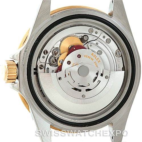 The image shows the internal mechanical movement of a Rolex Submariner 16613 Men's Steel and Gold (two tone) Blue Dial 16613 Men's Steel and Gold (two tone) Blue Dial watch from a back view with the case back removed.