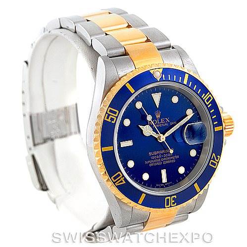 The image shows a Rolex Submariner 16613 Men's Steel and Gold (two tone) Blue Dial 16613 Men's Steel and Gold (two tone) Blue Dial watch at a three-quarter angle, highlighting the blue dial, bezel, and two-tone bracelet.