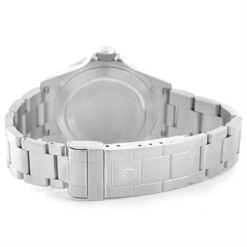 The image shows the back view of a Rolex Submariner 16610 Men
s Stainless Steel Black Dial 16610 Men
s Stainless Steel Black Dial watch, focusing on the case back and bracelet clasp.