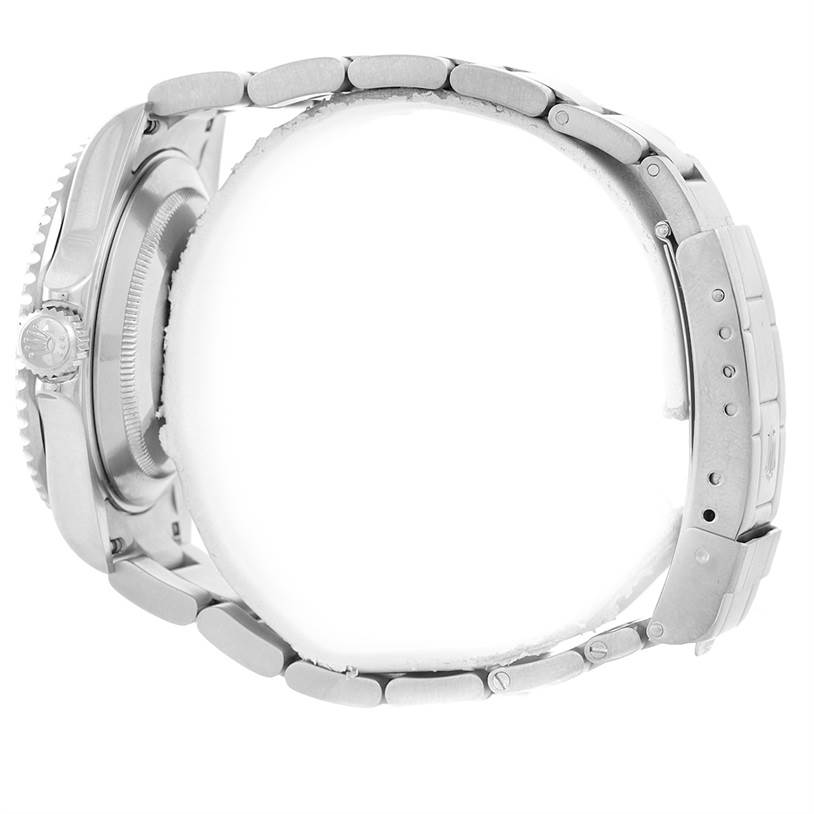 This image shows a side view of the Rolex Submariner 16610 Men
s Stainless Steel Black Dial 16610 Men
s Stainless Steel Black Dial, focusing on the crown, case, and bracelet.