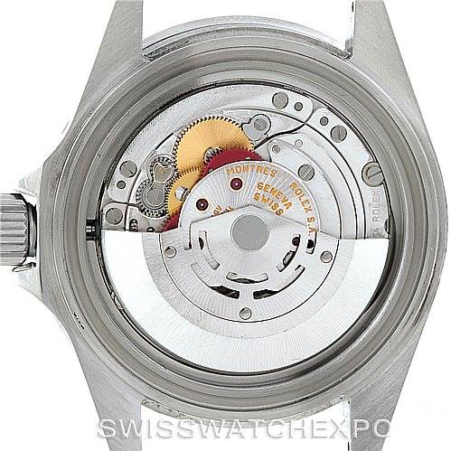 The image shows the internal mechanism of a Rolex Submariner 16610 Men
s Stainless Steel Black Dial 16610 Men
s Stainless Steel Black Dial watch from a rear angle, with its back cover removed.