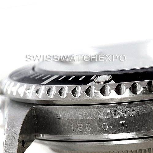 The image shows a close-up side view of the bezel, lugs, and part of the case of a Rolex Submariner 16610 Men
s Stainless Steel Black Dial 16610 Men
s Stainless Steel Black Dial model.