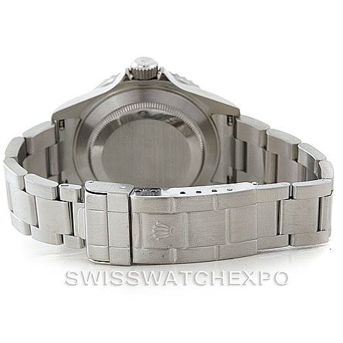 This image shows the back case and stainless steel bracelet of a Rolex Submariner 16610 Men
s Stainless Steel Black Dial 16610 Men
s Stainless Steel Black Dial watch.
