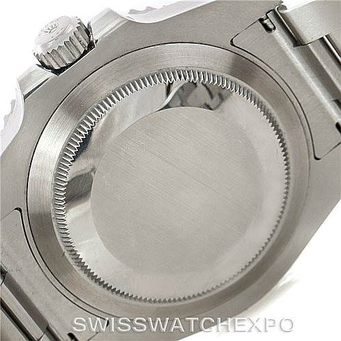 This image shows the back of a Rolex Submariner 114060 Men
s Stainless Steel Black Dial 114060 Men
s Stainless Steel Black Dial watch, focusing on the case back and crown.