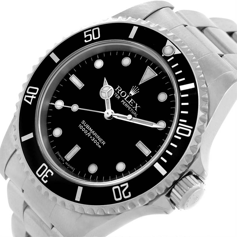 The image shows a close-up angle of the Rolex Submariner 14060 Men
s Stainless Steel Black Dial 14060 Men
s Stainless Steel Black Dial watch face, bezel, crown, and part of the metal bracelet.