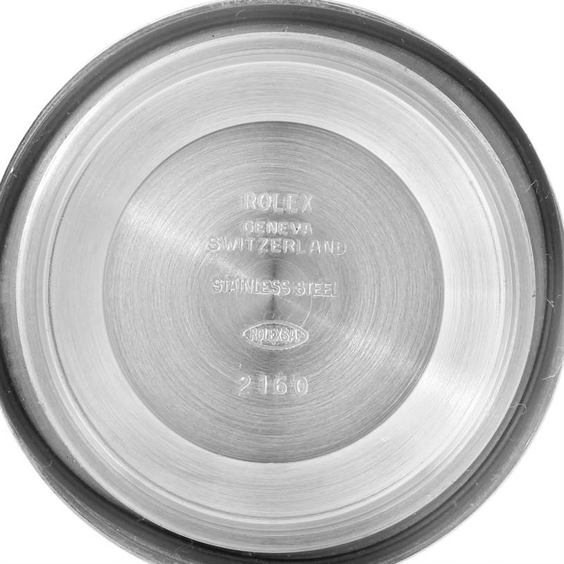 This image shows the inside of the case back of a Rolex Submariner 14060 Men
s Stainless Steel Black Dial 14060 Men
s Stainless Steel Black Dial watch, highlighting the engraved details and model information.