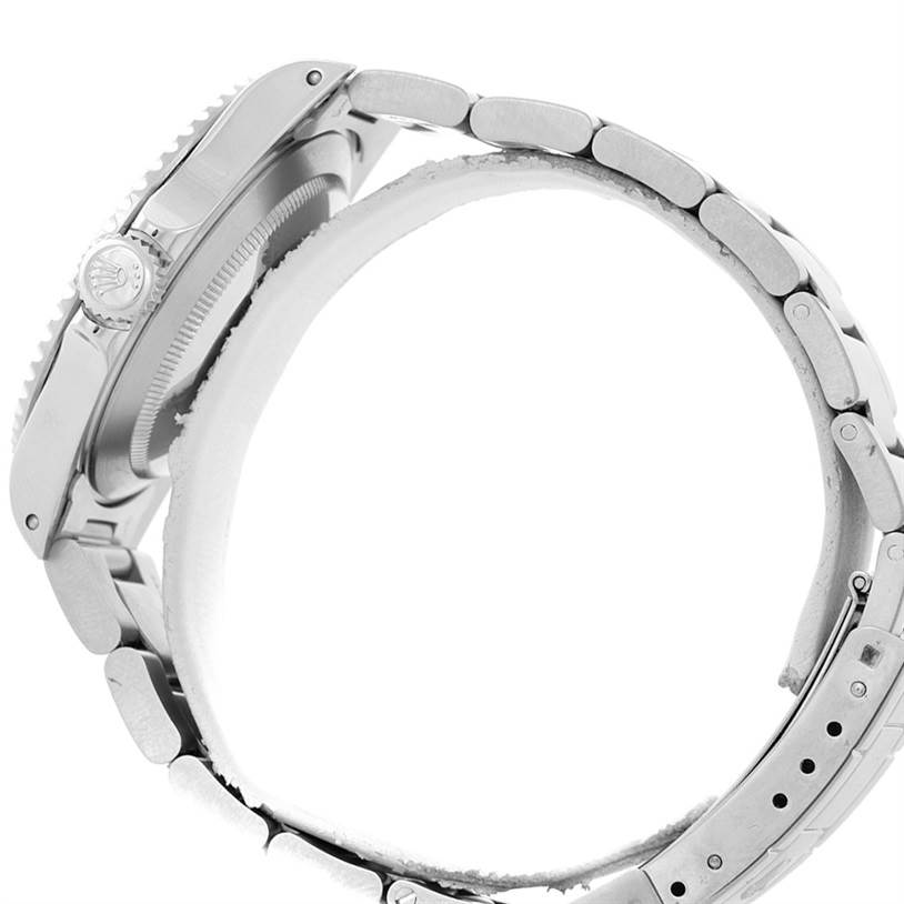 The image shows a side view of the Rolex Submariner 14060 Men
s Stainless Steel Black Dial 14060 Men
s Stainless Steel Black Dial watch, highlighting the watch case and bracelet.