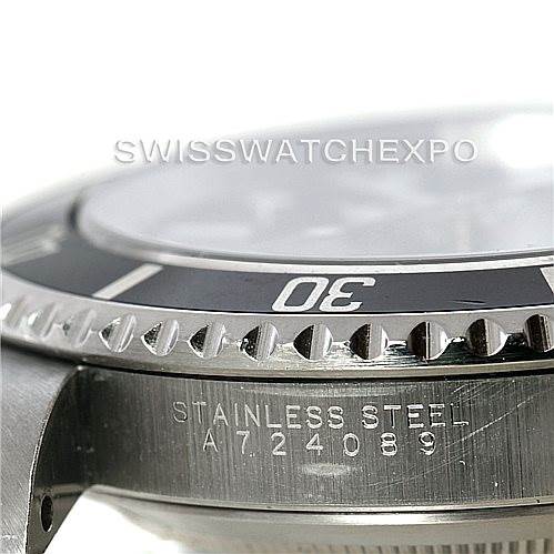 The image shows a close-up of the bezel and the case side of a Rolex Submariner 14060 Men
s Stainless Steel Black Dial 14060 Men
s Stainless Steel Black Dial watch, featuring the "30" mark.