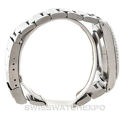 The image shows the side profile of the Rolex Submariner 14060 Men
s Stainless Steel Black Dial 14060 Men
s Stainless Steel Black Dial watch, highlighting its bracelet, clasp, and case.