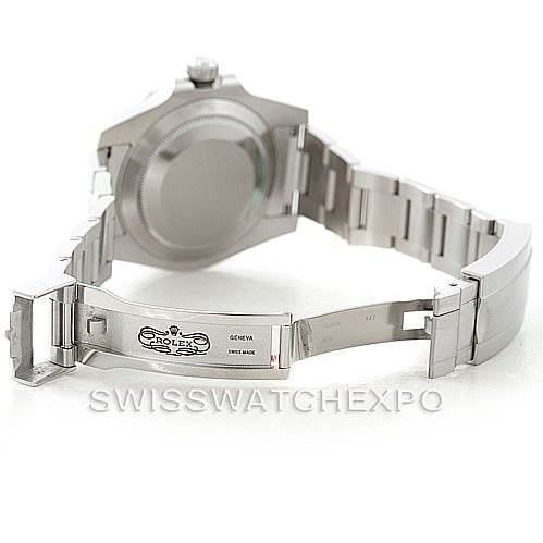 The image shows the back of a Rolex Submariner 116610LV Men's Stainless Steel Green Dial 116610LV Men's Stainless Steel Green Dial watch, highlighting the case back and the open clasp.