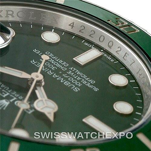 The image shows a close-up of the Rolex Submariner 116610LV Men's Stainless Steel Green Dial 116610LV Men's Stainless Steel Green Dial watch face, highlighting the dial, markers, and part of the bezel.
