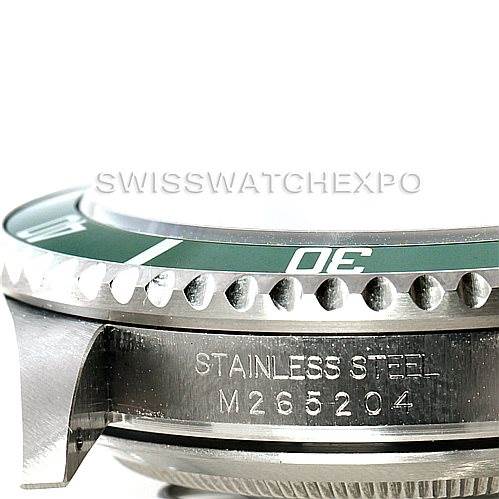 The image shows a side view of the stainless steel case and green bezel of a Rolex Submariner 16610V Men
s Stainless Steel Black Dial 16610V Men
s Stainless Steel Black Dial watch, including its model engraving.