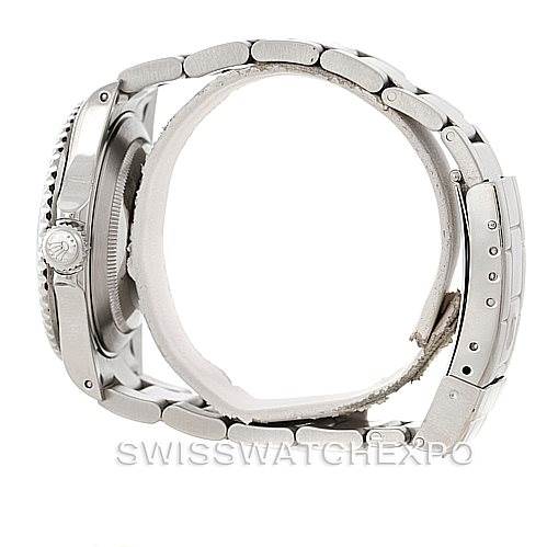 The image shows a side view of a Rolex Submariner 16610 Men
s Stainless Steel Black Dial 16610 Men
s Stainless Steel Black Dial watch, highlighting the case, crown, and metal bracelet.