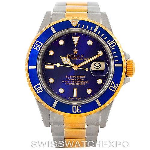 The image shows a Rolex Submariner 16613 Men's Steel and Gold (two tone) Blue Dial 16613 Men's Steel and Gold (two tone) Blue Dial watch from a front angle, highlighting a blue and gold bezel, dial, and two-tone bracelet.