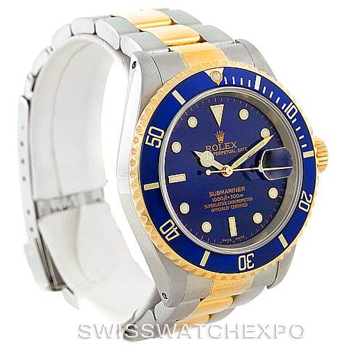 The image shows a front-side angle of a Rolex Submariner 16613 Men's Steel and Gold (two tone) Blue Dial 16613 Men's Steel and Gold (two tone) Blue Dial watch, displaying the face, bezel, and bracelet.