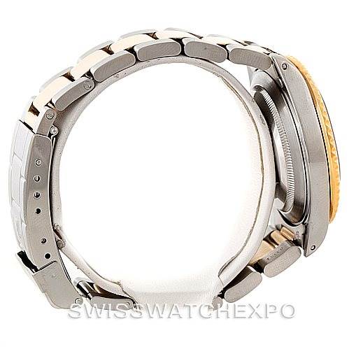 The image shows the side view of a Rolex Submariner 16613 Men's Steel and Gold (two tone) Blue Dial 16613 Men's Steel and Gold (two tone) Blue Dial, displaying the bracelet, case, and partially the bezel.