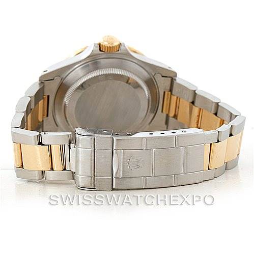 The image shows the back view of a Rolex Submariner 16613 Men's Steel and Gold (two tone) Blue Dial 16613 Men's Steel and Gold (two tone) Blue Dial watch, highlighting the bracelet and clasp.