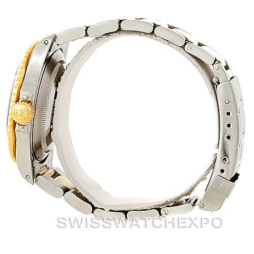 This image shows a side view of a Rolex Submariner 16613 Men's Steel and Gold (two tone) Blue Dial 16613 Men's Steel and Gold (two tone) Blue Dial watch, highlighting the case, crown, and part of the bracelet.