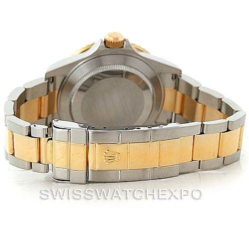 This image shows the back and bracelet of a Rolex Submariner 16613 Men
s Steel and Gold (two tone) Blue Dial 16613 Men
s Steel and Gold (two tone) Blue Dial watch, featuring a two-tone metal finish.