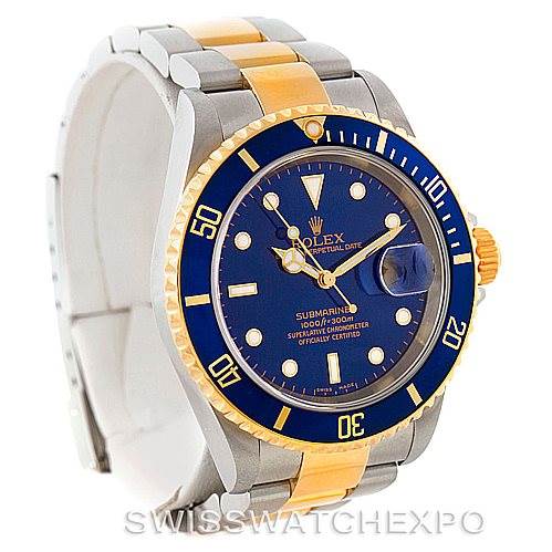 This image shows a Rolex Submariner 16613 Men
s Steel and Gold (two tone) Blue Dial 16613 Men
s Steel and Gold (two tone) Blue Dial watch from an angled front view, highlighting the blue dial, bezel, and two-tone bracelet.