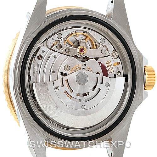 This image shows the back view of the Rolex Submariner 16613 Men's Steel and Gold (two tone) Champagne Dial 16613 Men's Steel and Gold (two tone) Champagne Dial watch, exposing its intricate internal movement and components.