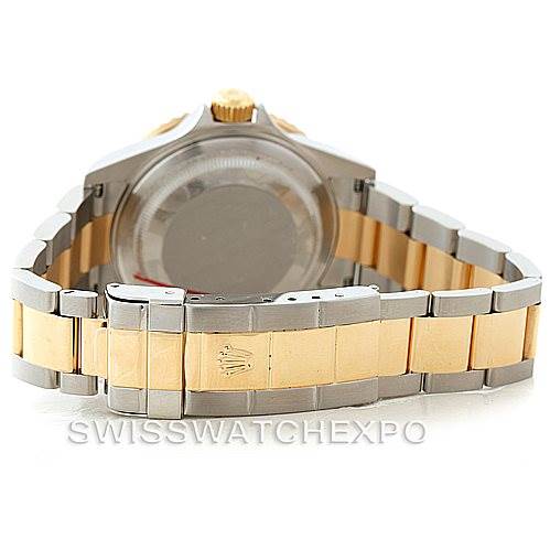 The image shows the back case and bracelet clasp of a Rolex Submariner 16613 Men's Steel and Gold (two tone) Champagne Dial 16613 Men's Steel and Gold (two tone) Champagne Dial watch.