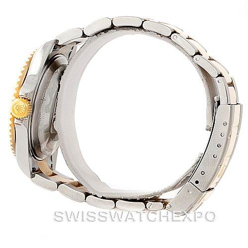 This image shows the side view of a Rolex Submariner 16613 Men's Steel and Gold (two tone) Champagne Dial 16613 Men's Steel and Gold (two tone) Champagne Dial, highlighting the band and the edge of the case.