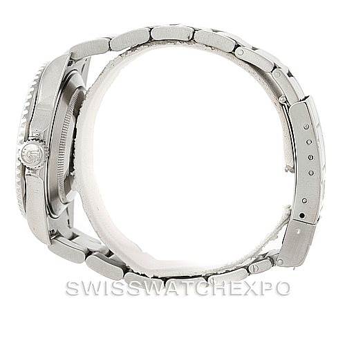 This image shows a side view of a Rolex Submariner 16610V Men
s Stainless Steel Black Dial 16610V Men
s Stainless Steel Black Dial watch, highlighting its case, crown, bracelet, and clasp.