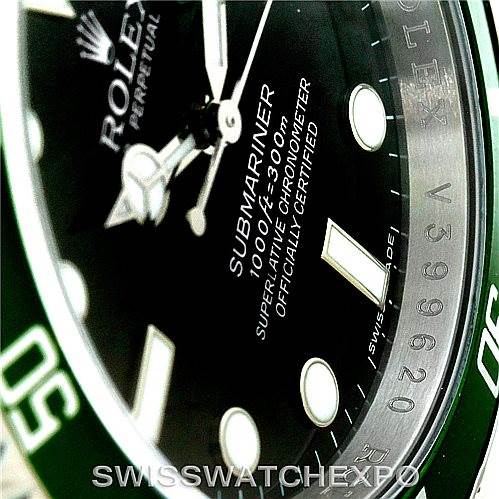 Close-up angle of the dial and bezel of a Rolex Submariner 16610V Men
s Stainless Steel Black Dial 16610V Men
s Stainless Steel Black Dial, showcasing the brand name, model, and specific details on the watch face.