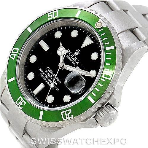 This image shows a Rolex Submariner 16610V Men
s Stainless Steel Black Dial 16610V Men
s Stainless Steel Black Dial watch from a side angle, displaying its green bezel, black dial, and crown.