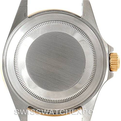 The image shows the back and crown of a Rolex Submariner 16613 Men's Steel and Gold (two tone) Blue Dial 16613 Men's Steel and Gold (two tone) Blue Dial watch case.