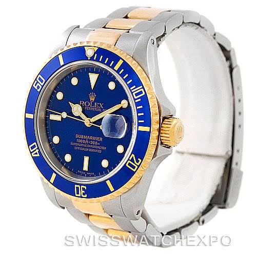 This is a side-angle view of a Rolex Submariner 16613 Men's Steel and Gold (two tone) Blue Dial 16613 Men's Steel and Gold (two tone) Blue Dial watch, showing the face, bezel, crown, and bracelet.