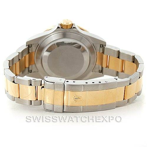 This image shows the back case and bracelet of a Rolex Submariner 16613 Men's Steel and Gold (two tone) Grey Dial 16613 Men's Steel and Gold (two tone) Grey Dial watch from a rear angle.