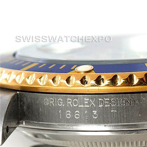 The image shows a close-up side view of the bezel and case of a Rolex Submariner 16613 Men's Steel and Gold (two tone) Grey Dial 16613 Men's Steel and Gold (two tone) Grey Dial model, displaying the model number "16613 T."